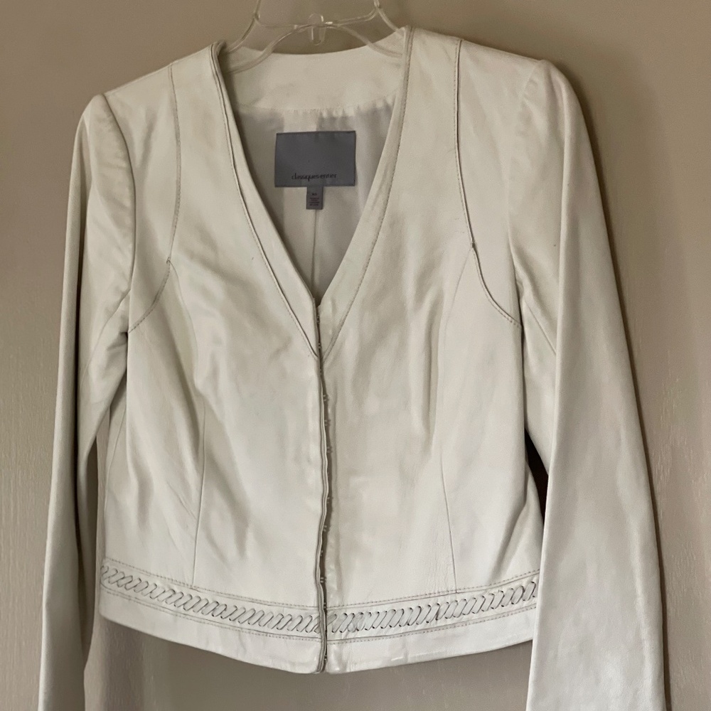 Perfect for rodeo season! Beautifully detailed white leather jacket.